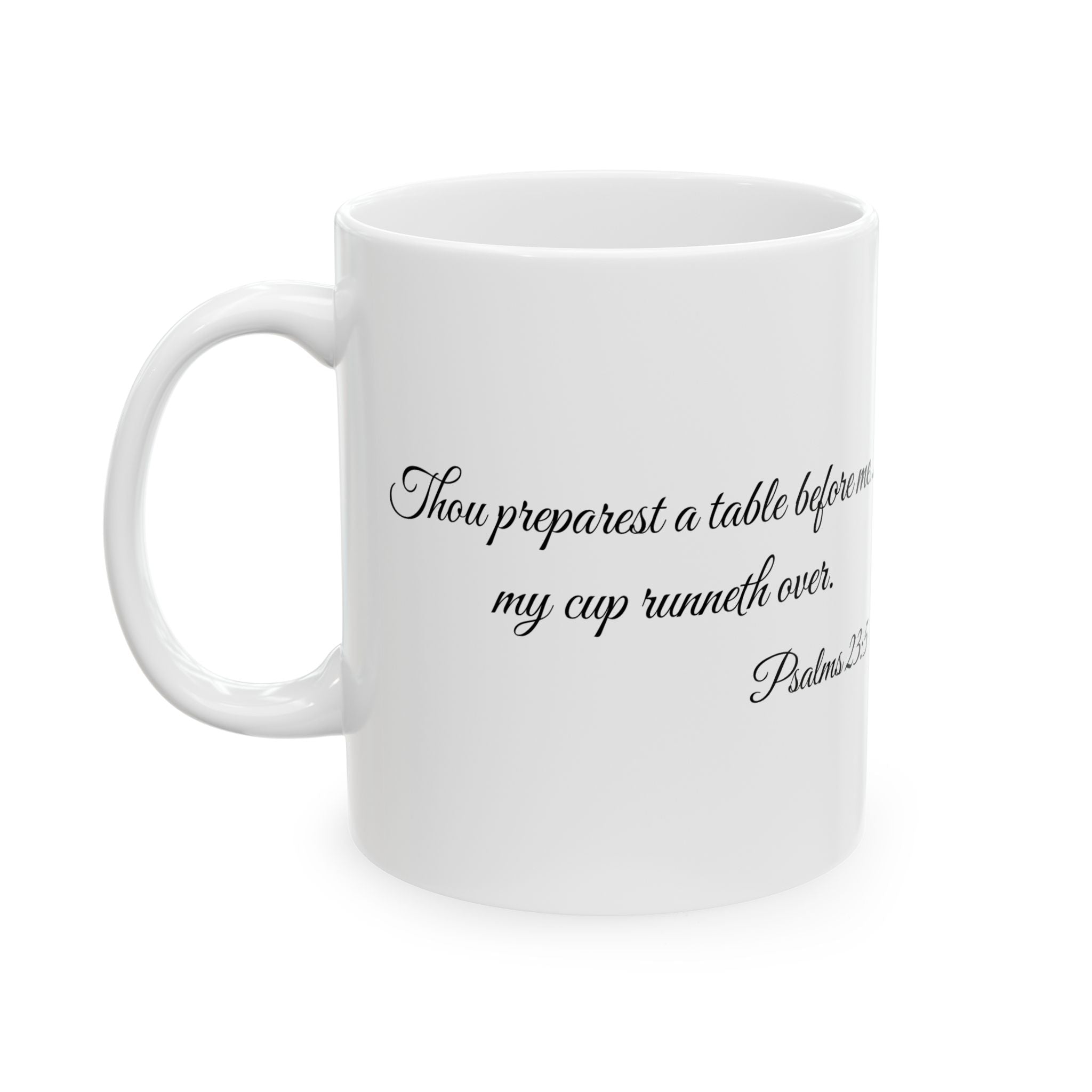 White mug with black text on a white background